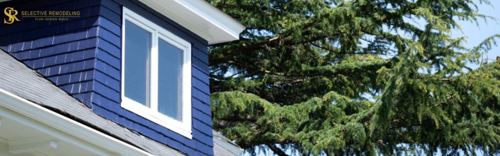 Illustration of a Nantucket dormer featuring a central gable with two adjoining shed dormers, enhancing home design and space.