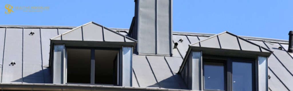 Close-up view of a louvre dormer showcasing slatted design for ventilation and architectural style on a roof